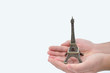Layout Eiffel Tower on your hands man, isolated Layout Eiffel Tower on your hands man, isolated