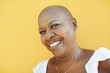 Photo: mature african woman smiling at camera mature african woman smiling at camera