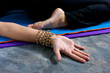Photo: woman doing Yoga pose reclined hero up close woman doing Yoga pose reclined hero up close