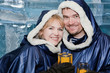 Happy couple having a drink in ice-bar