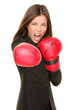 Businesswoman boxing