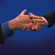 Crushing business handshake