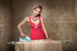 Pretty young lady ironing