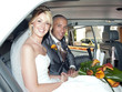 Bride and Groom in Wedding Car