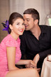 young couple flirting at restaurant table young couple flirting at restaurant table