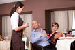 waitress taking the order from restaurant table