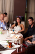 people having meal served in restaurant