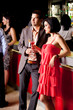 young couple in bar having fun young couple in bar having fun
