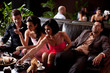 young people eating deserts, man borred