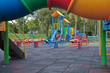 colorful playground in a public park. colorful playground in a public park.