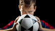 Photo: boy stares with ball frontal boy stares with ball frontal
