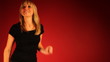 Dancing woman and red glowing background Dancing woman and red glowing background