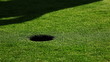 Close up of golf player taking his put