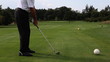 Golf player teeing off on a beautiful golf course