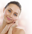 Beautiful Healthy Woman touching her skin