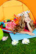 Children fashion little girl lying indoor of camping tent