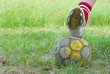 Photo: Soccer on old and bad field with shabby ball closeup. Soccer on old and bad field with shabby ball closeup.