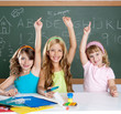 Photo: clever kids student group at school classroom clever kids student group at school classroom