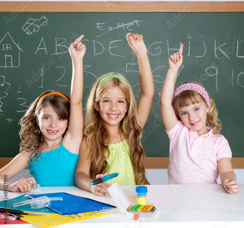 Photo: clever kids student group at school classroom clever kids student group at school classroom