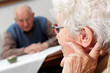aged woman with glasses and hearing aid aged woman with glasses and hearing aid