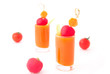 Vegetable juice in short glasses over white