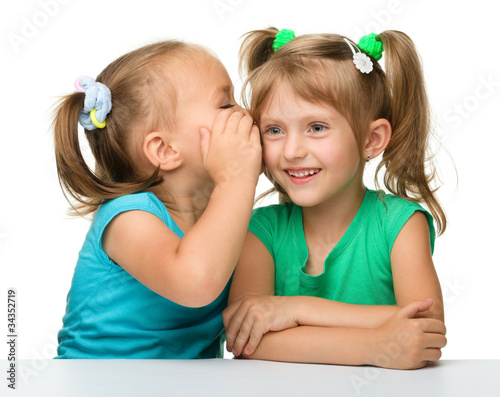 Photo: Two little girls are chatting Two little girls are chatting