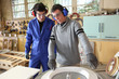 Carpenter and apprentice Carpenter and apprentice