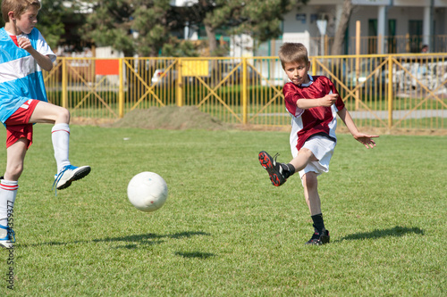 Photo: Little Boy playing soccer Little Boy playing soccer