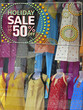 window display with 50 % Discount board at a shop, India