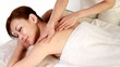 A woman having back massage