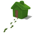 Green grass house with grass footprints