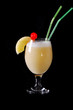 Pina colada drink cocktail glass with pineapple