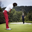 Photo: Two female golfer on green Two female golfer on green