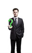Young businessman with a question mark on his hand Young businessman with a question mark on his hand