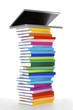 Laptop on book stack, side view Laptop on book stack, side view