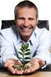 Business person happy about growth of financial wealth.