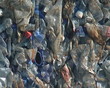 Huge piles of pressed pet plastic bottles prepared for recycling Huge piles of pressed pet plastic bottles prepared for recycling