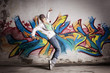 Dancer girl in front of graffiti. Dancer girl in front of graffiti.