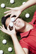 Gold player on floor with balls on eyes. Gold player on floor with balls on eyes.