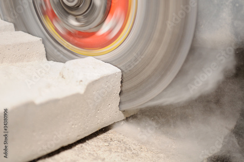 Photo: Grinder Cutting Concrete Block Grinder Cutting Concrete Block