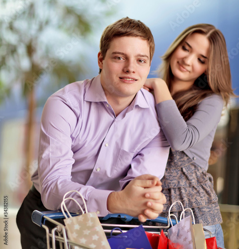 Photo: young couple shopping together young couple shopping together