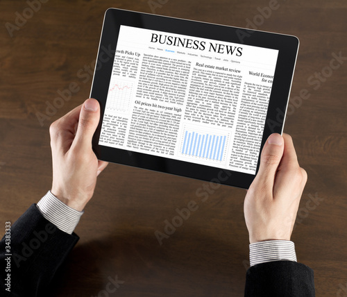 Foto: Business News On Tablet PC Business News On Tablet PC