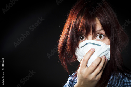 Photo: girl wearing protective mask girl wearing protective mask