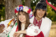 Foto: Slav girl with wreath and young cossack at nature Slav girl with wreath and young cossack at nature