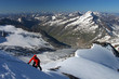Climber ascending snow slope in the Austrian Alps Climber ascending snow slope in the Austrian Alps