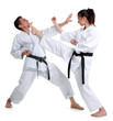 Karate. Young girl and a men in a kimono. Battle sports capture