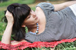 Attractive girl, lying on a grass Attractive girl, lying on a grass