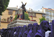 Costaleros bearing a Tronos during Semana Santa in Malaga, Spain Costaleros bearing a Tronos during Semana Santa in Malaga, Spain