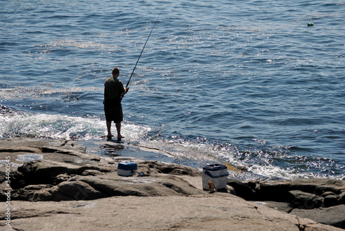Photo: Fishing on a Rocky Shore Fishing on a Rocky Shore