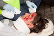 Hands helping the wounded